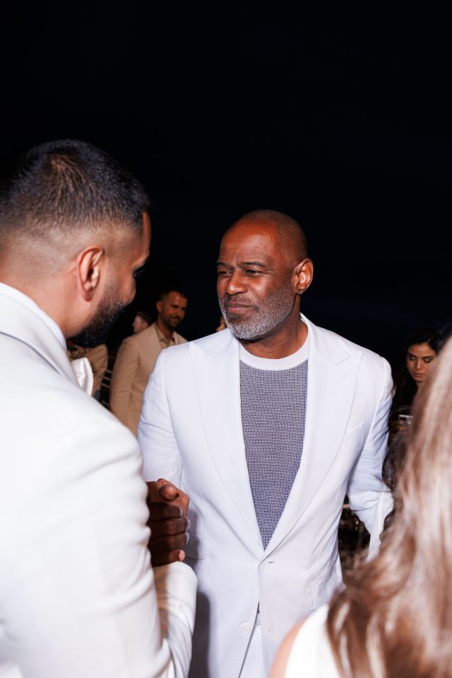 Grammy-nominated Brian McKnight pictured with Umar at the reception