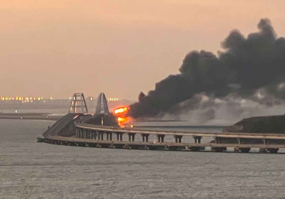 A fire rages at the Kerch bridge in Crimea, October 2022