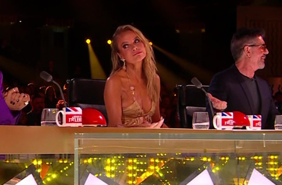 Amanda Holden was seen pulling a face as Nabe performed