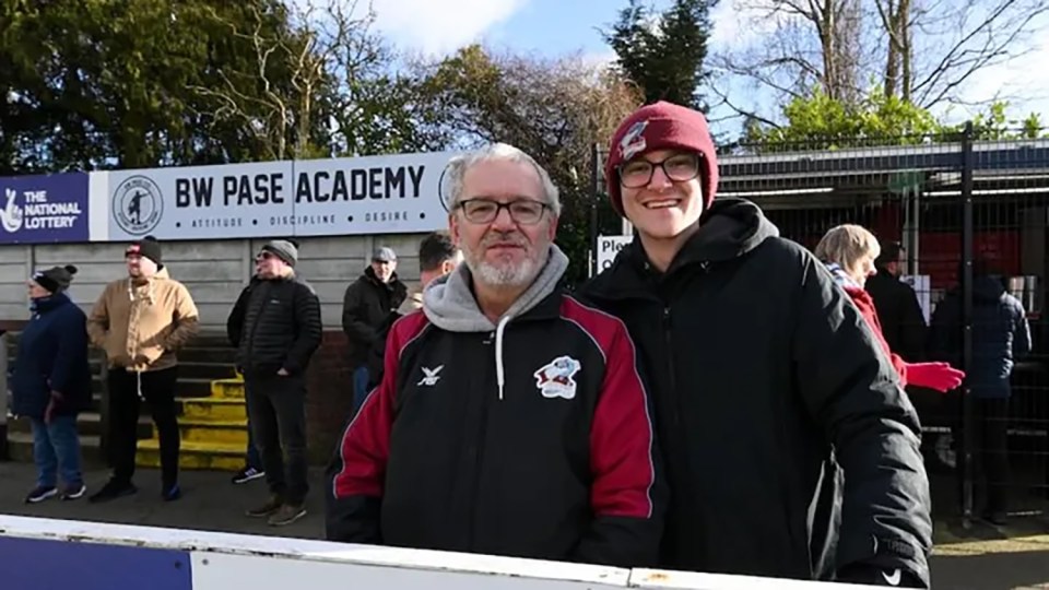 Martyn Maidment, left, pictured with son Ben, collapsed after he was struck by a wayward ball — and then hit his head on the ground as he fell