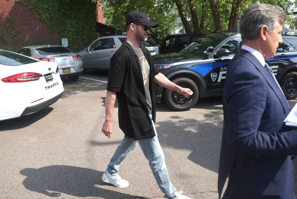 Justin Timberlake looked downcast leaving a police station in The Hamptons with his laywer Ed Burke