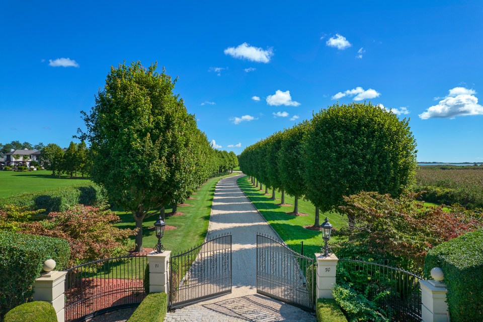 A winding, narrow drive leads up to the property