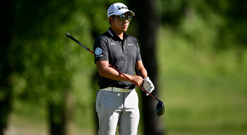 Golfer C.T. Pan watched his caddie, Mike 'Fluff' Cowan, suffer an injury on the third hole