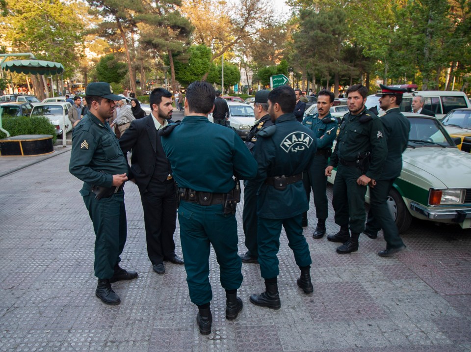 Iranian morality cops arrest a man in Tehran