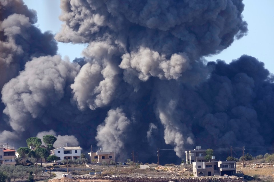 Black smoke rises from an Israeli strike on Aita al-Shaab, a Lebanese border village with Israel