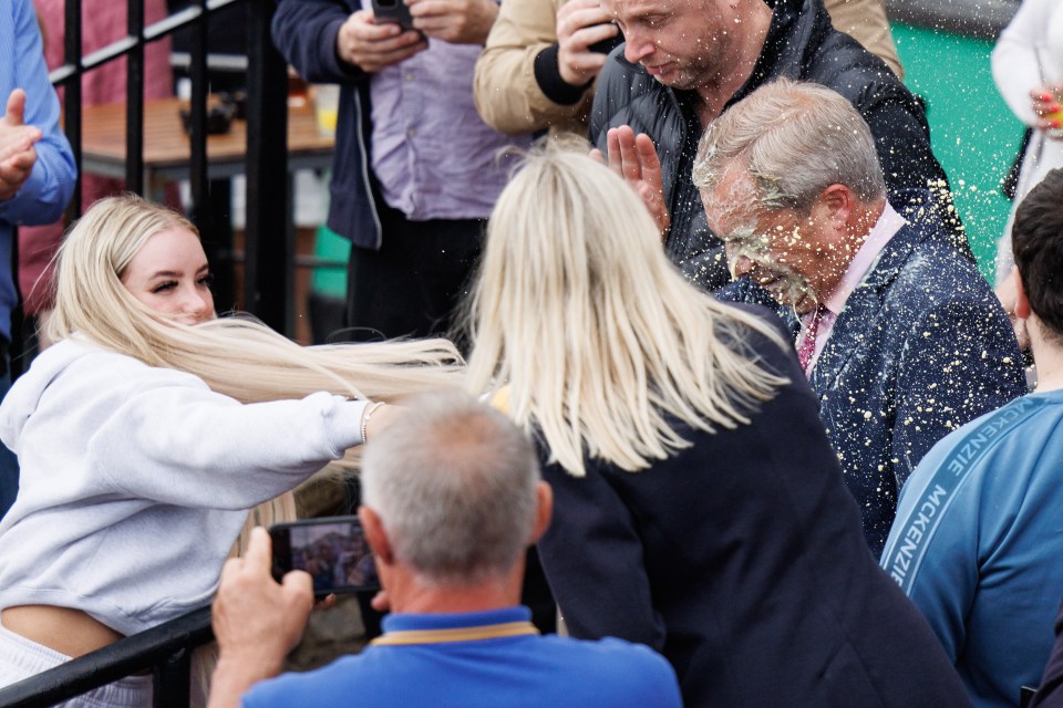 Farage flinched as he was hit by the sweet drink