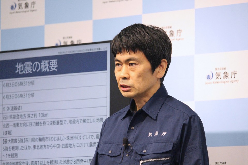 Satoshi Harada of Japan's Meteorological Agency speaks during a press conference in Tokyo on Monday