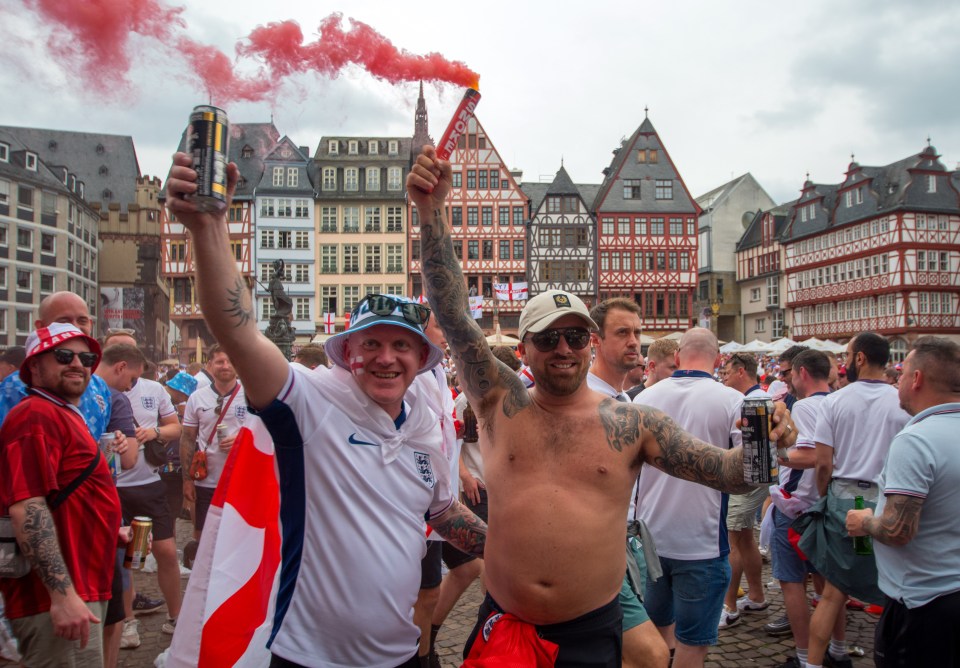 Red smoke billowed through the air as fans let off flares