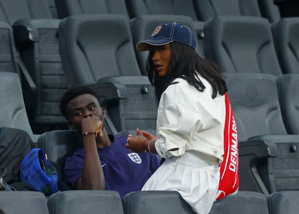 Bukayo Saka put his feet up alongside girlfriend Tolami Benson