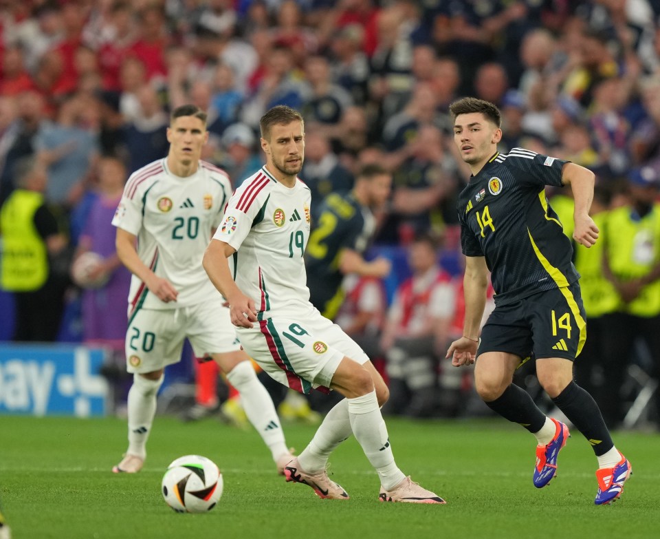 Varga battling against Scotland's Billy Gilmour earlier in the match