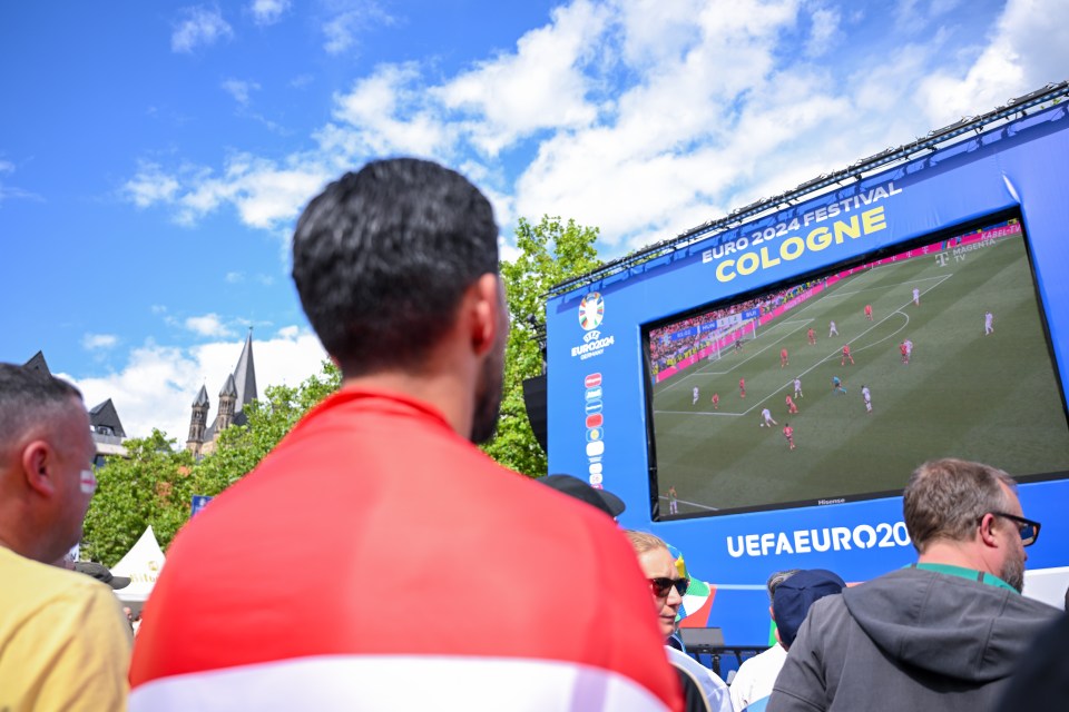 A giant TV screen will show the Group C clash