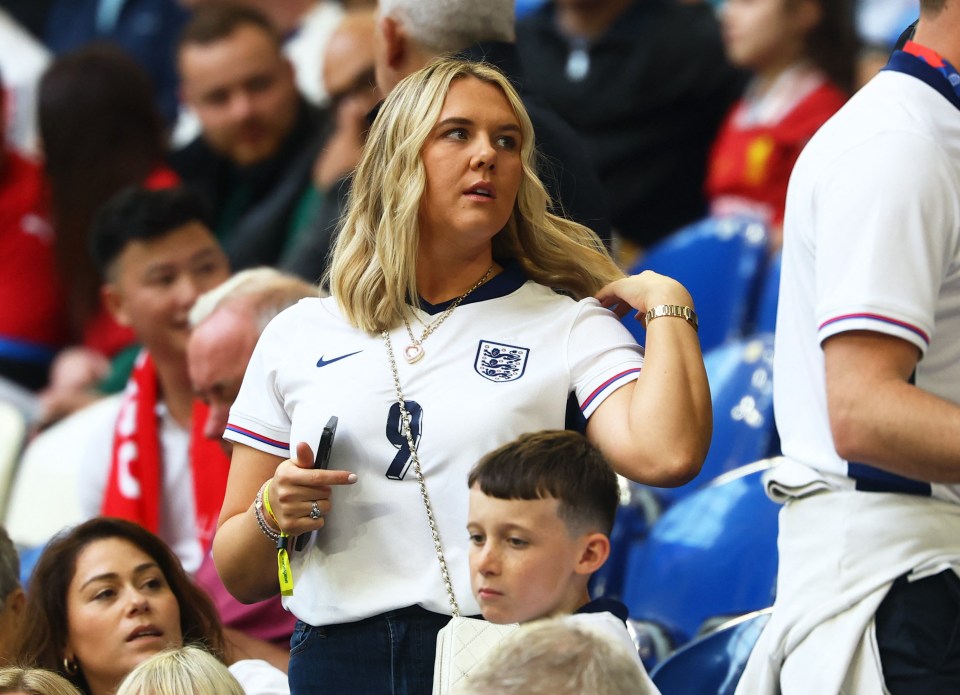 Harry Kane's wife Katie Goodland had her fella's shirt on in the stands