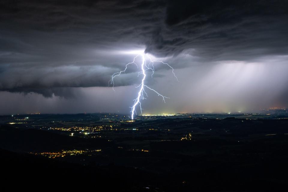 Weather forecasters have predicted storms  (Pictured: lightning strikes in Germany, May 2024)