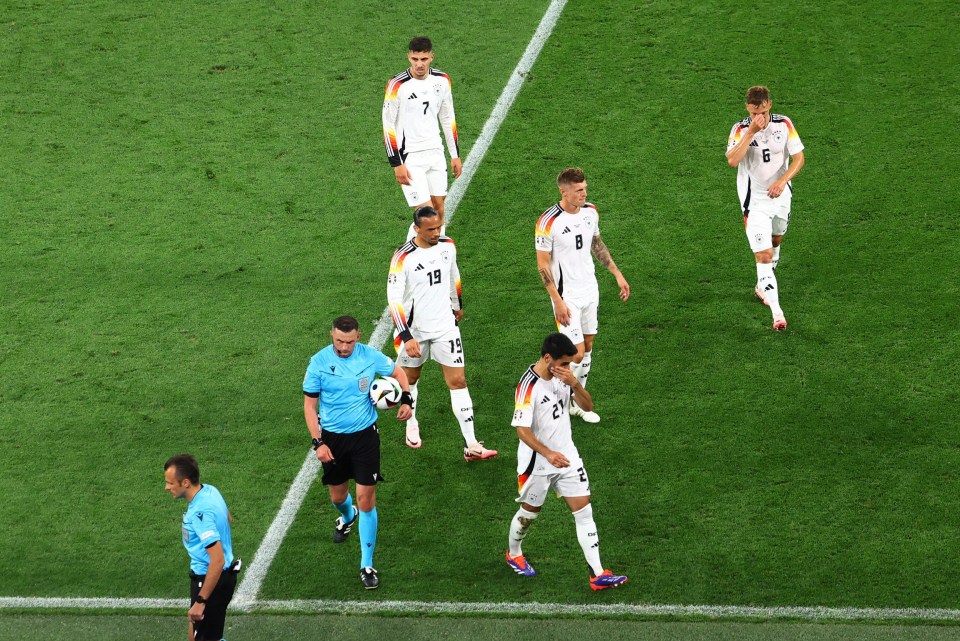 Referee Michael Oliver had to take the players off the pitch