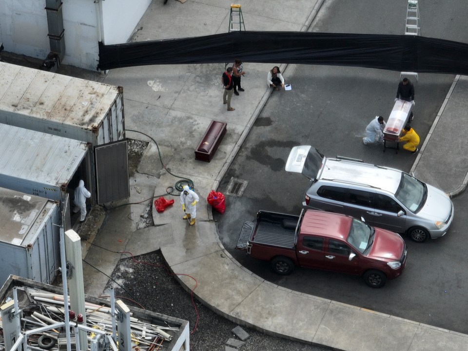 Body parts were said to be overflowing from the only working refrigerated container after it was overcrowded with the corpses or murder victims