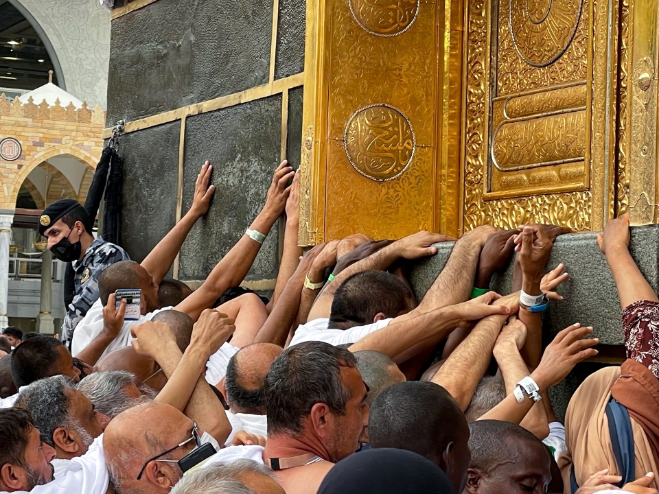 Muslims streaming into the Grand Mosque court to fulfil their religious duty