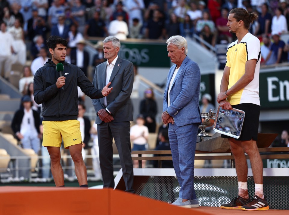 Bjorn Borg presented the trophies to the finalists