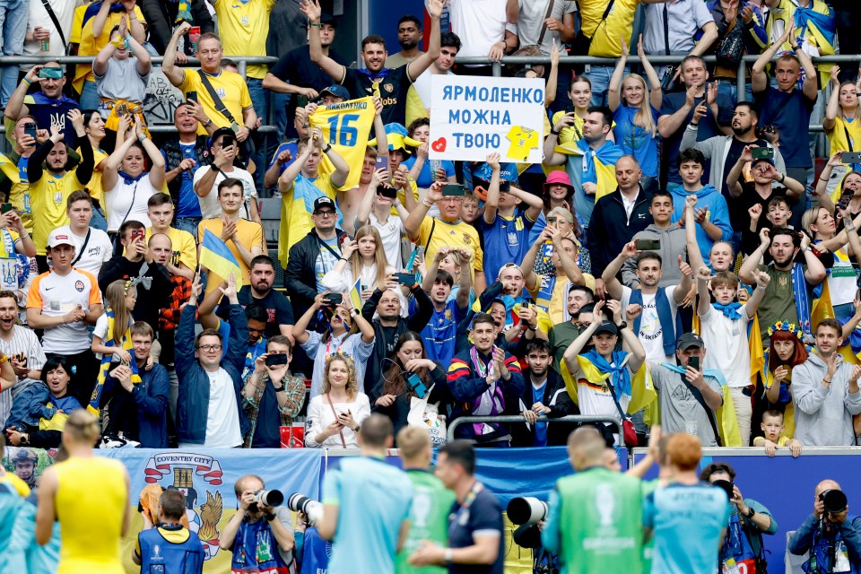 Ukraine fans celebrating after the match against Slovakia last Friday that saw them win 2-1