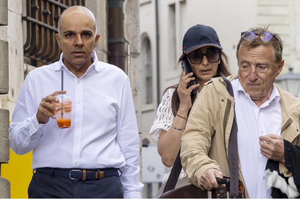 Ajay Hinduja and his wife, Namrata, with their lawyer Robert Assael outside the court building in Geneva earlier this month