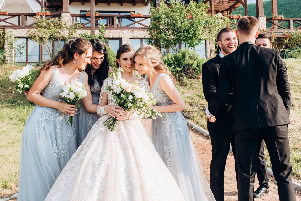 The bride opted for fake flowers rather than a traditional bouquet