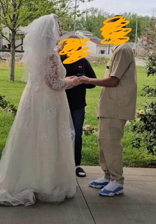 People questioned whether the groom was a convict due to his tan suit