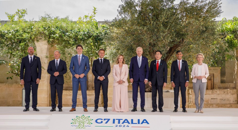 Leaders of the G7 countries, including PM Rishi Sunak, pose at the opening day of the summit