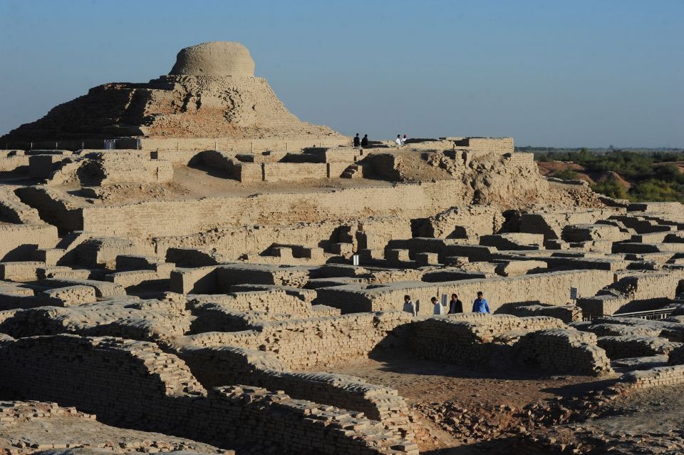 Visitors walk through the UNESCO World Heritage archaeological site of Mohenjo-Daro