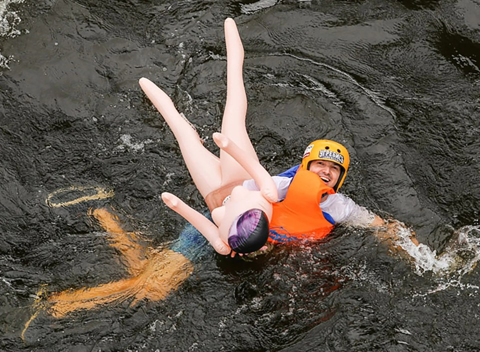 The sex doll rafting was described as 'an insane performance that had to be stopped' due to the negative reaction it was causing to Russia