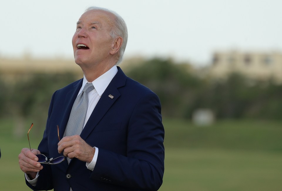 Joe Biden looked in his own world as Italian PM Giorgia Meloni put on a skydiving display for her fellow leaders