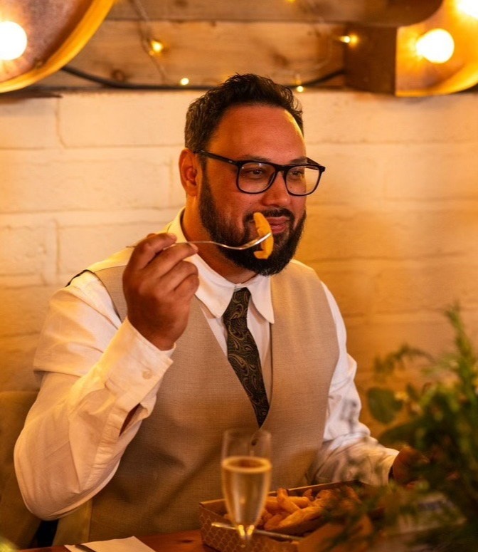 Josh Titmouth tucks into fish and chips after caterers let him and bride-to-be Immie Teed down on the day before their wedding day