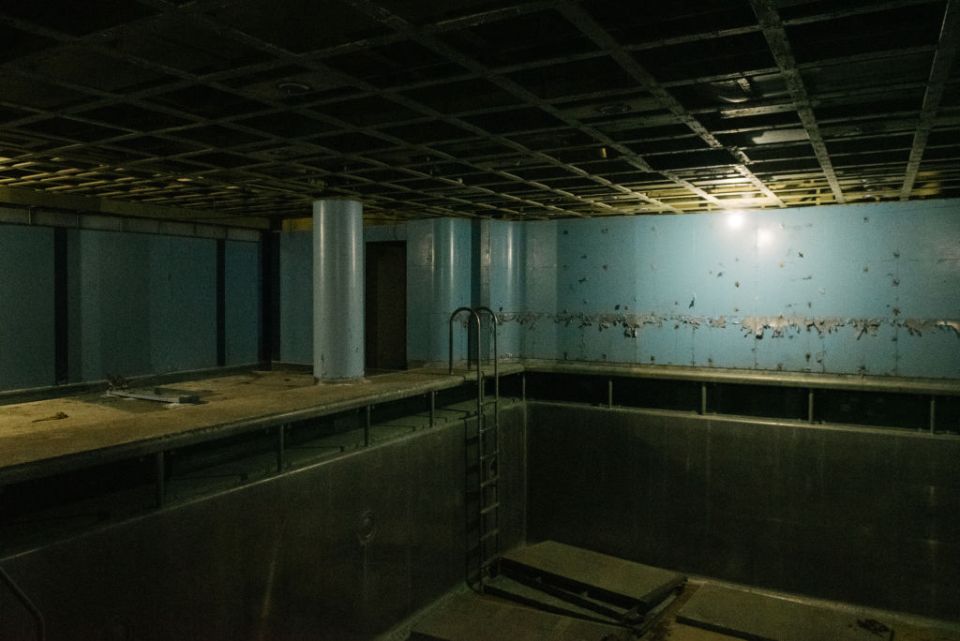 An empty pool remains inside the retired SS United States ocean liner ship as reminder of a bygone era