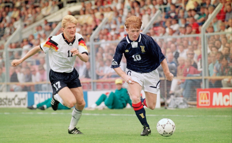 McCall, seen taking on Germany's Stefan Effenberg at the Euros in 1992, also took part in the tournament four years later