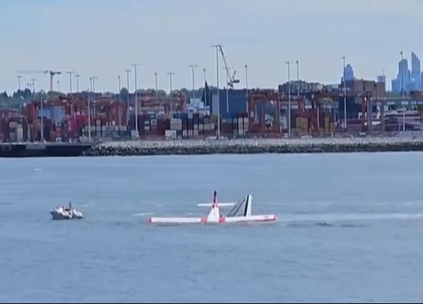 The aircraft quickly submerges beneath the waves as help arrives