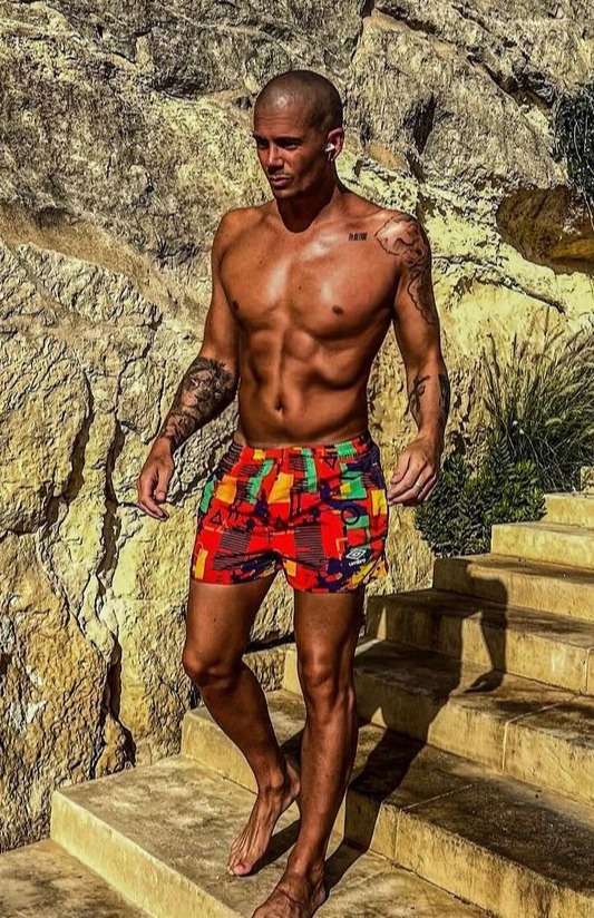 Max George looked incredibly tanned on holiday