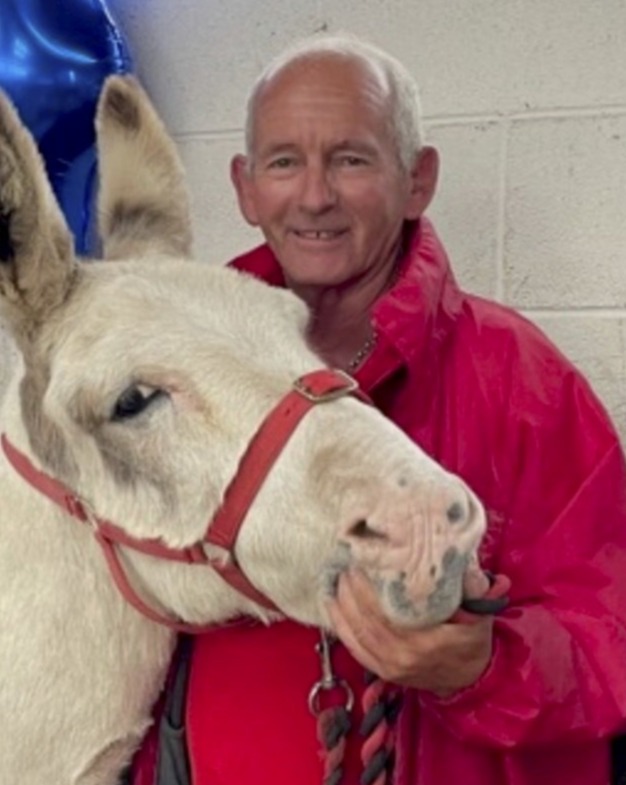 Seaside donkey ride boss, John Nuttall, 66, is so worried about obese kids he now weighs them before they climb on to the saddle