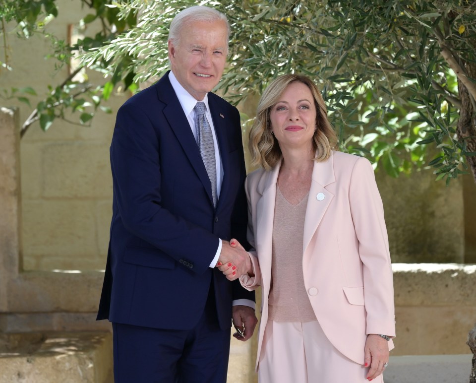 Biden with Giorgia Meloni when they arrived at the G7 event