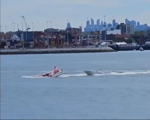 The boat makes its way to the plane almost immediately after the crash