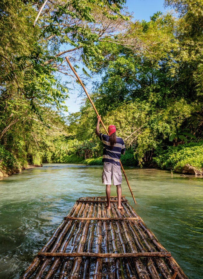 Book an excursion on a 30ft bamboo raft to sail down the Martha Brae River