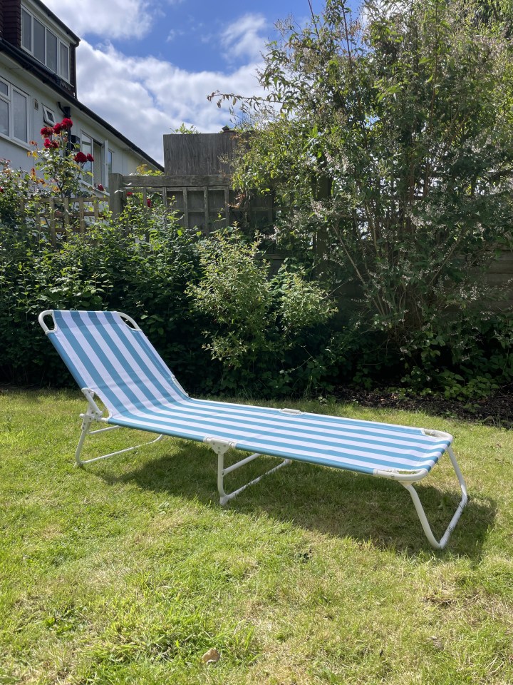 Blue striped metal sun lounger