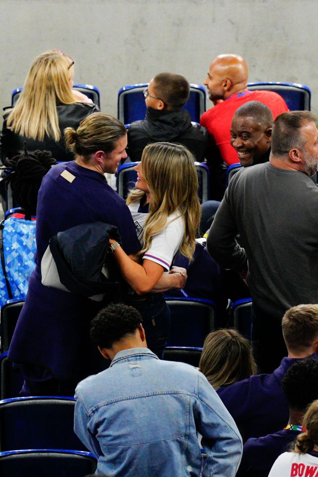 Conor Gallagher and partner Aine May Kennedy have a celebratory cuddle after