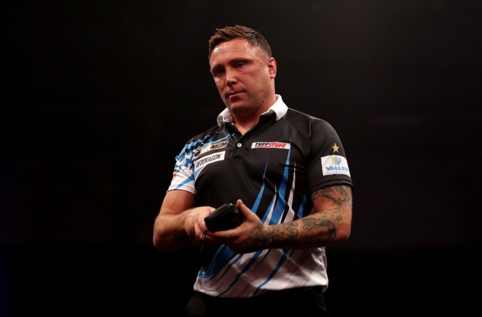 EXETER, ENGLAND - FEBRUARY 29: Gerwyn Price of Wales looks dejected as he leaves the stage after defeat to Rob Cross of England (not pictured) during the Quarter-Final at the 2024 BetMGM Premier League Darts at Westpoint on February 29, 2024 in Exeter, England. (Photo by Ryan Hiscott/Getty Images)