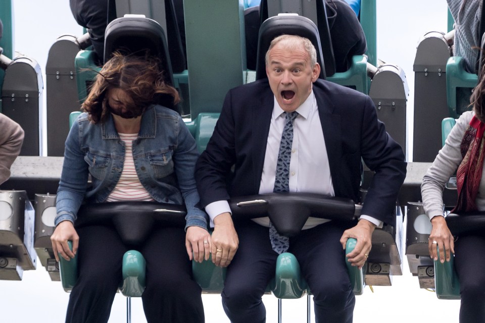 Ed Davey rides on the 'Rush' ride at Thorpe Park amusement park