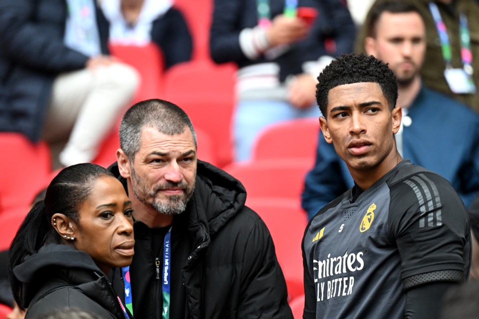 Jude speaking to his parents during a Real Madrid training session