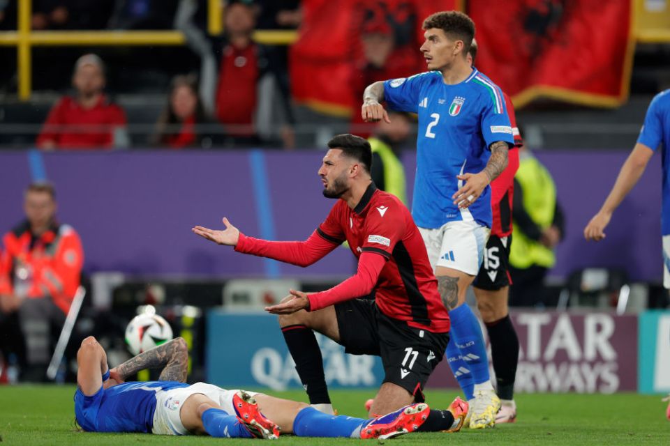 DORTMUND, GERMANY - JUNE 15: (L-R) Alessandro Bastoni of Italy , Armando Broja of Albania , Giovanni Di Lorenzo of Italy  during the  EURO match between Italy  v Albania at the Signal Iduna Park on June 15, 2024 in Dortmund Germany (Photo by Rico Brouwer/Soccrates/Getty Images)