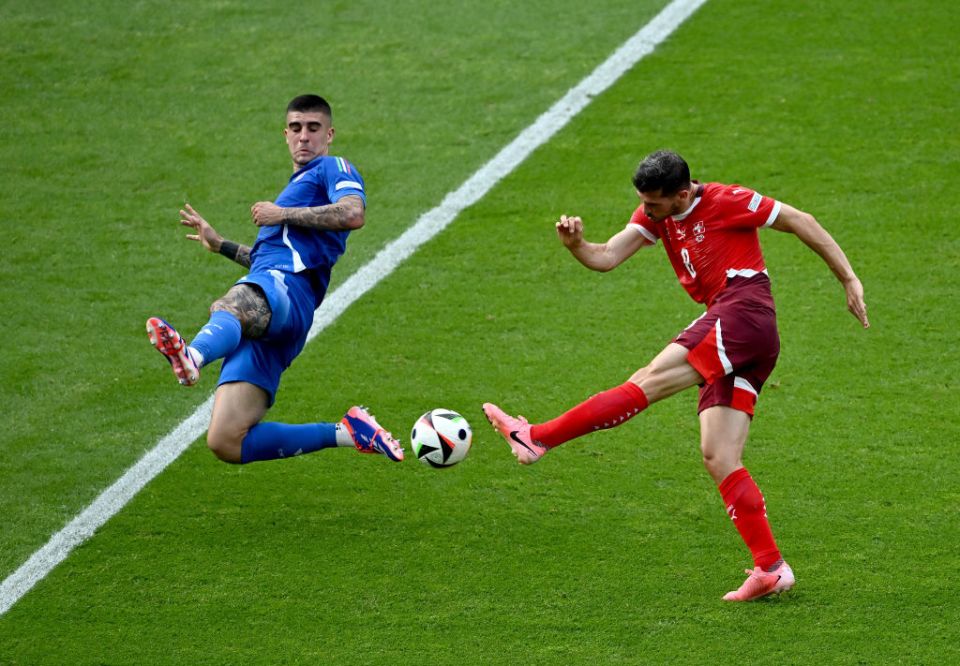 BERLIN, GERMANY - JUNE 29: Remo Freuler of Switzerland scores his team's first goal during the UEFA EURO 2024 round of 16 match between Switzerland and Italy at Olympiastadion on June 29, 2024 in Berlin, Germany. (Photo by Dan Mullan/Getty Images)