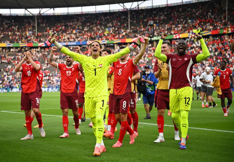 BERLIN, GERMANY - JUNE 29: Yann Sommer of Switzerland celebrates with teammates after the team's victory and progression to the quarter final in the UEFA EURO 2024 round of 16 match between Switzerland and Italy at Olympiastadion on June 29, 2024 in Berlin, Germany. (Photo by Justin Setterfield/Getty Images)