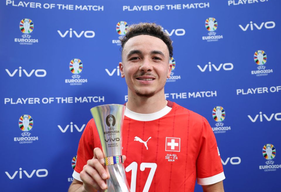 BERLIN, GERMANY - JUNE 29: Ruben Vargas of Switzerland poses for a photo with the Vivo Player of the Match award after the team's victory and progression to the quarter final in the UEFA EURO 2024 round of 16 match between Switzerland and Italy at Olympiastadion on June 29, 2024 in Berlin, Germany. (Photo by Maja Hitij - UEFA/UEFA via Getty Images)