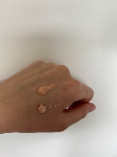 The Laura Mercier primer (top) looks more of a golden hue, whereas Sculpted (bottom) is slightly more pink, though both blend into a translucent dewy finish