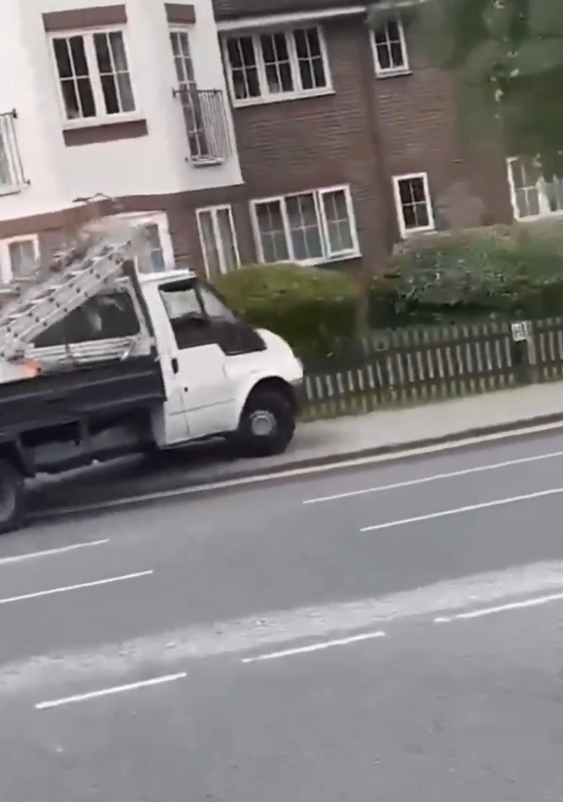 The driver then goes up onto the pavement, having turned right at the T-junction