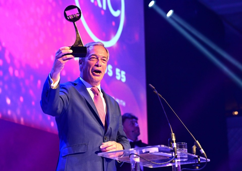 Nigel Farage was booed as he appeared on stage to accept a prestigious TV award